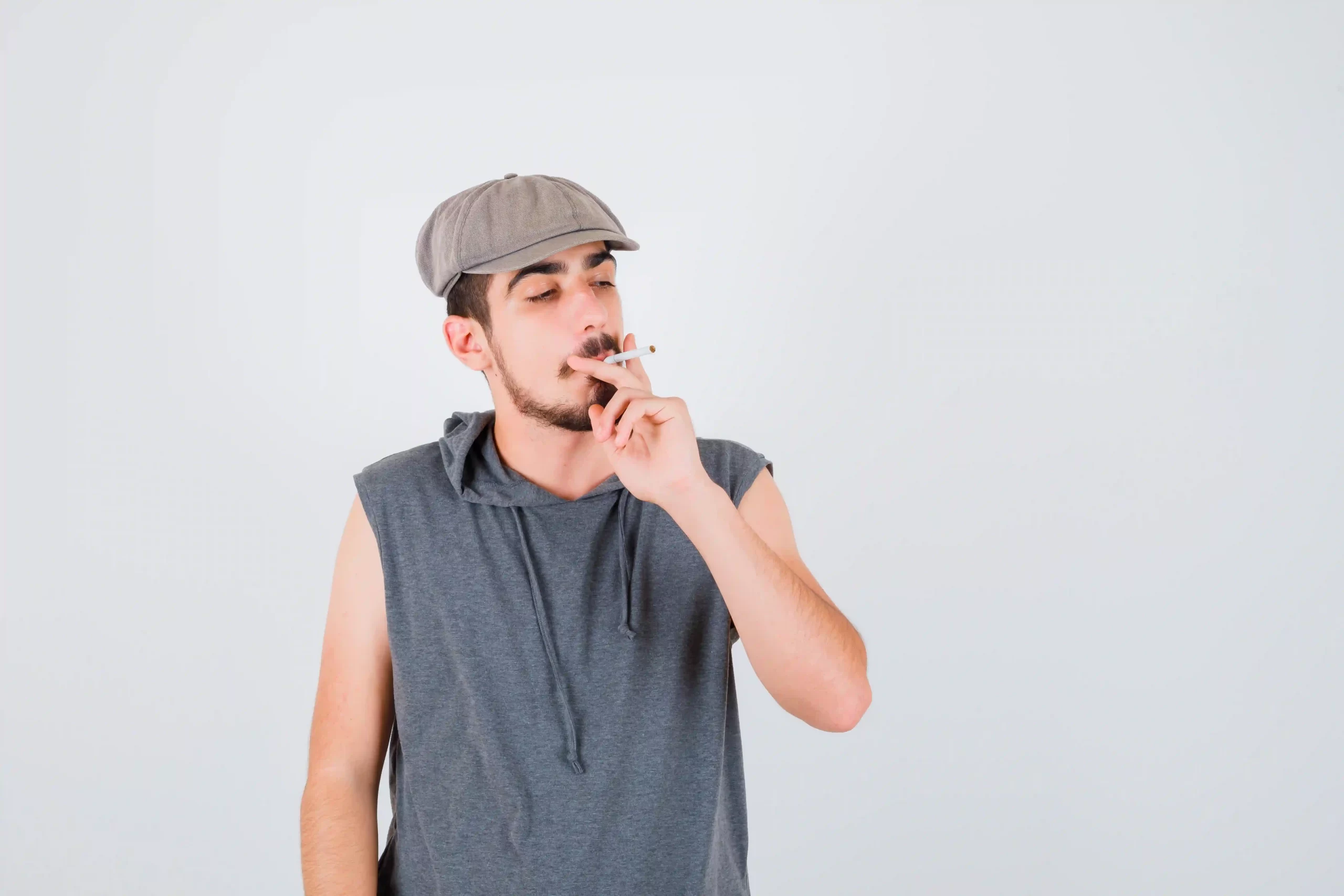 young-worker-smoking-cigarette.webp