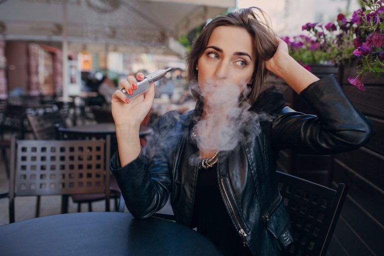 1woman-thinking-with-electronic-cigarette-hand